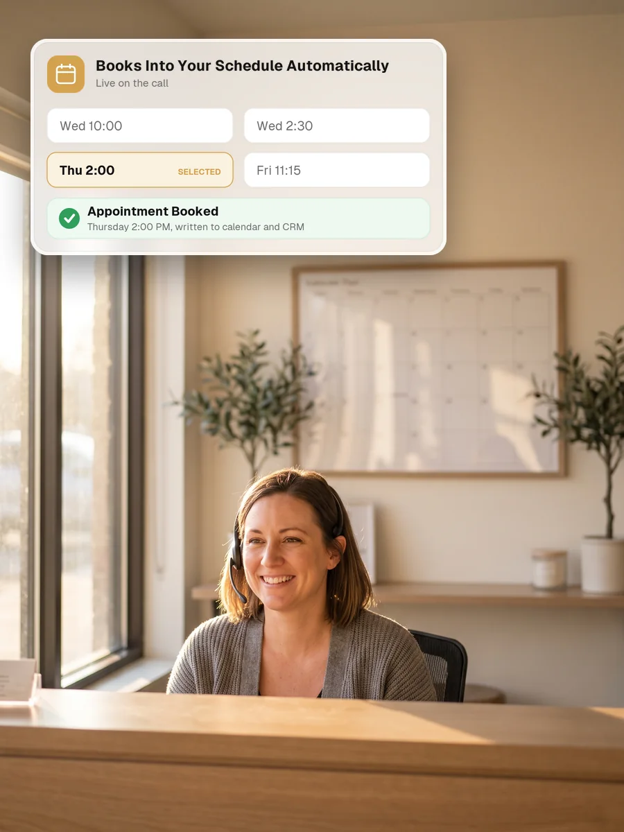 A receptionist with a headset smiling at a bright front desk